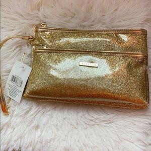 Brand new gold clutch wristlet